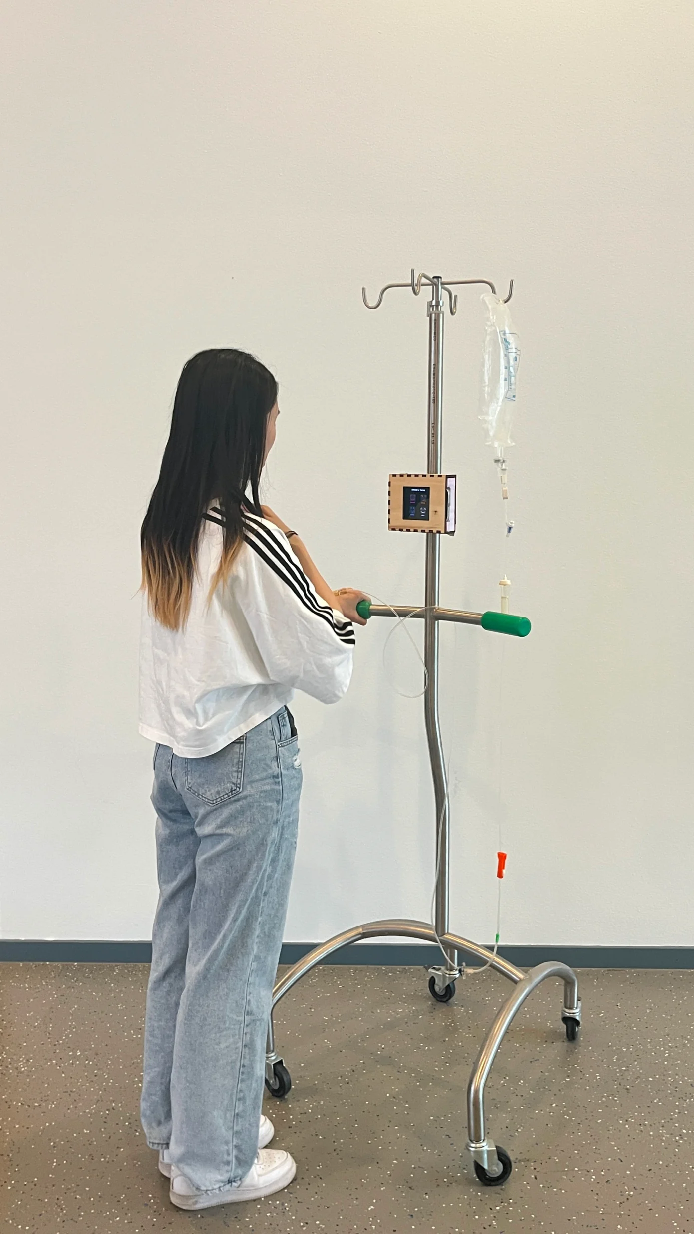 A participant using the IV-pole interface